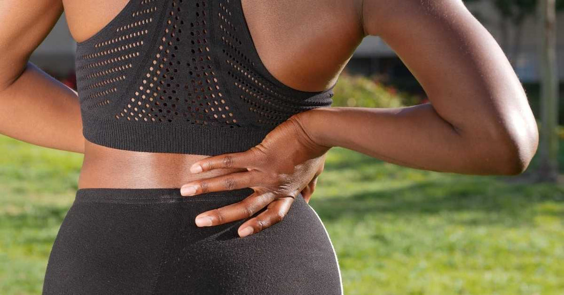 Pourquoi le bas du dos se bloque après un footing ? Causes, erreurs et solutions